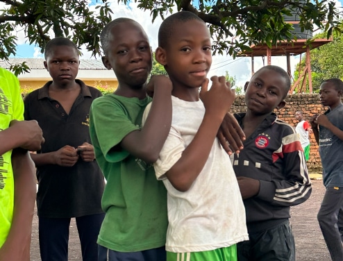 Smiling children in Democratic Republic of the Congo looking at the camera